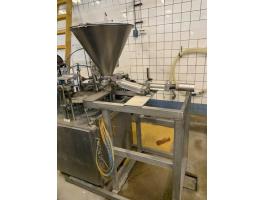 Tégelytöltő és zárógép